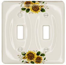 Load image into Gallery viewer, Kiln fired gloss white ceramic porcelain wall plate. One of a Kind fresh country Sunflower floral pattern on a square cover plate for bathroom, spa, or kitchen. high quality and durability. Stays white and gleaming for years to come. Single Toggle cover plate configuration. Screws Included. Easy to clean with a damp cloth. Do not over tighten screws to avoid cracking the plate. Do not use automatic screwdrivers.
