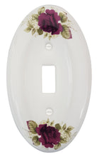 Load image into Gallery viewer, Kiln fired gloss white genuine porcelain wall plate. One of a Kind Charming Red Roses  with green leaves floral pattern on an oval cover plate for bathroom, spa, or kitchen. high quality and durability.  Stays white and shiny or years to come. Single Toggle cover plate configuration.  Screws Included. Easy to clean with a damp cloth. Do not over tighten screws to avoid cracking the plate. Do not use automatic screwdrivers.
